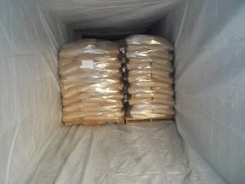 large cargo pallets of bags in a container