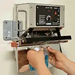 vertical wall mounted heat sealer